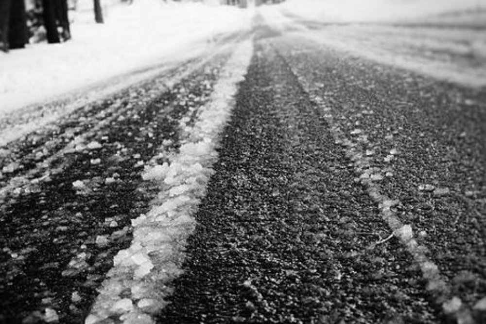 bulk road salt sprinkled on the road